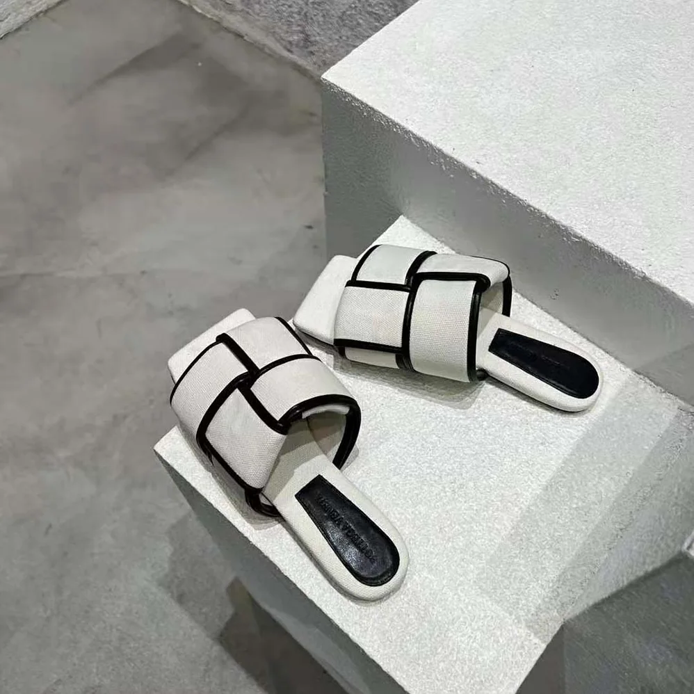 Bottega Veneta Patch Flat Mule Padded Intreccio Canvas and Leather Flat Mules for Women Bottega Veneta Patch Flat Mule Padded Intreccio Canvas and Leather Flat Mules for Women