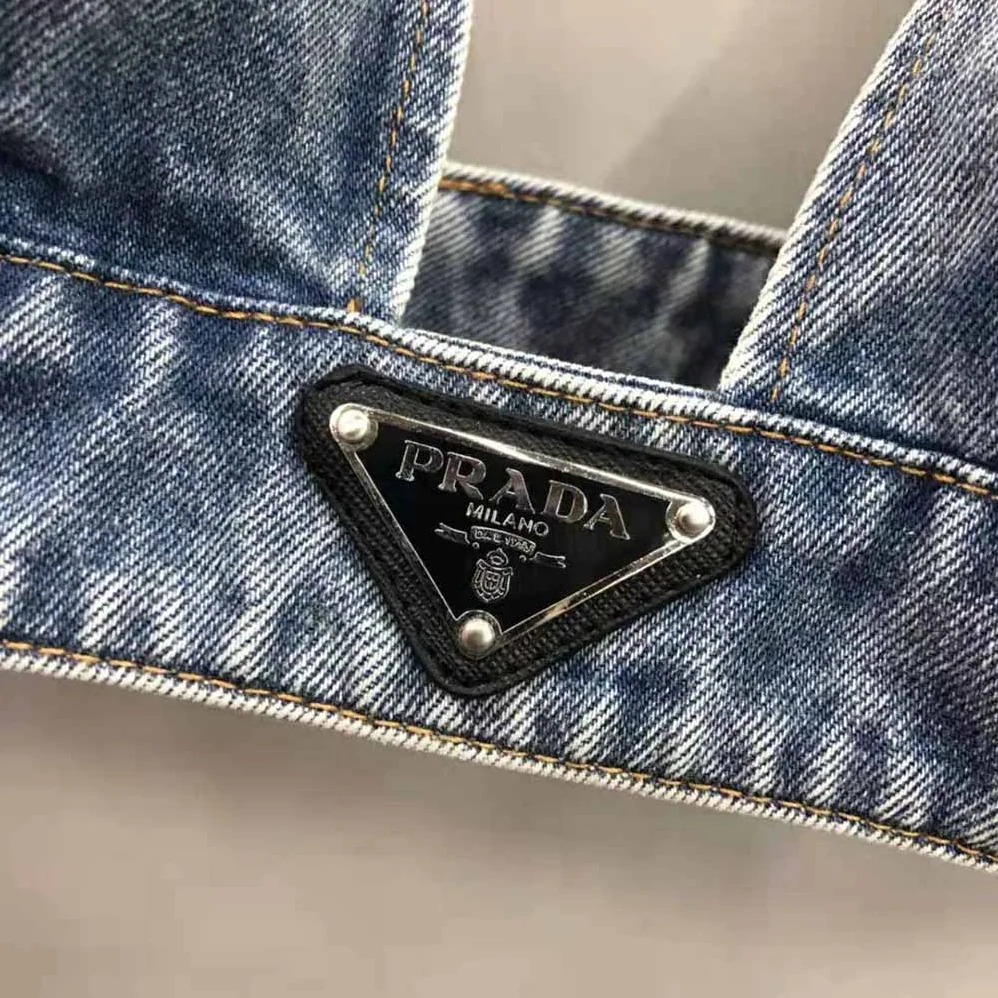 Prada Organic Denim Top with Plunging V Neck is Made of Washed Organic Denim for Women in Blue