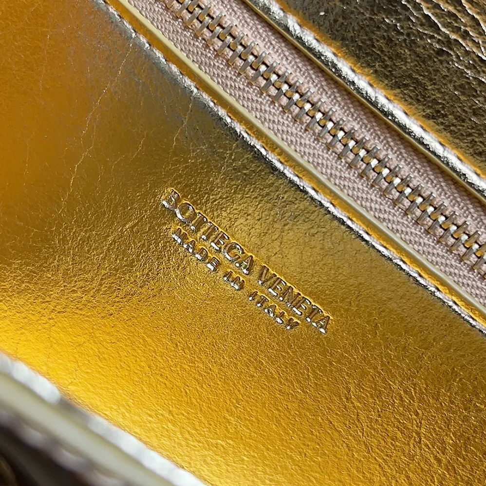 Bottega Veneta Andiamo Clutch in Intrecciato Leather for Women in Gold Bottega Veneta Andiamo Clutch in Intrecciato Leather for Women in Gold