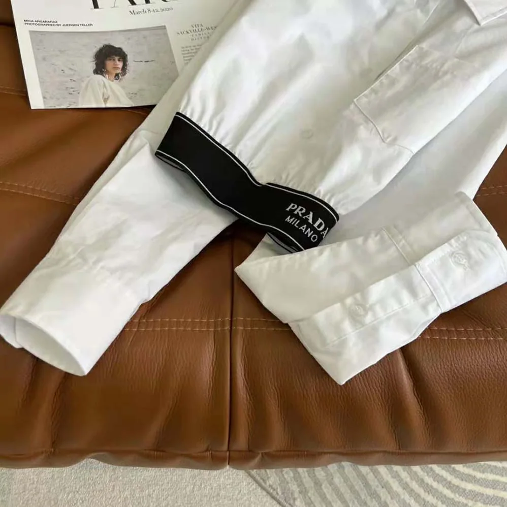 Prada Stretch Poplin Shirt with a Hybrid Design Reinvents for Women Prada Stretch Poplin Shirt with a Hybrid Design Reinvents for Women