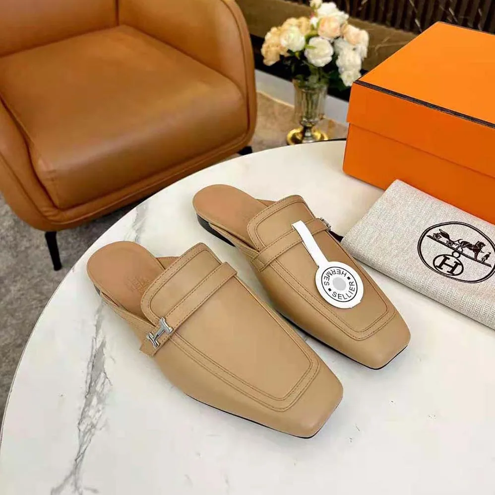 Hermes Groupie Mule in Goatskin with Miniature Palladium-Plated Paris Buckle for Women in Beige