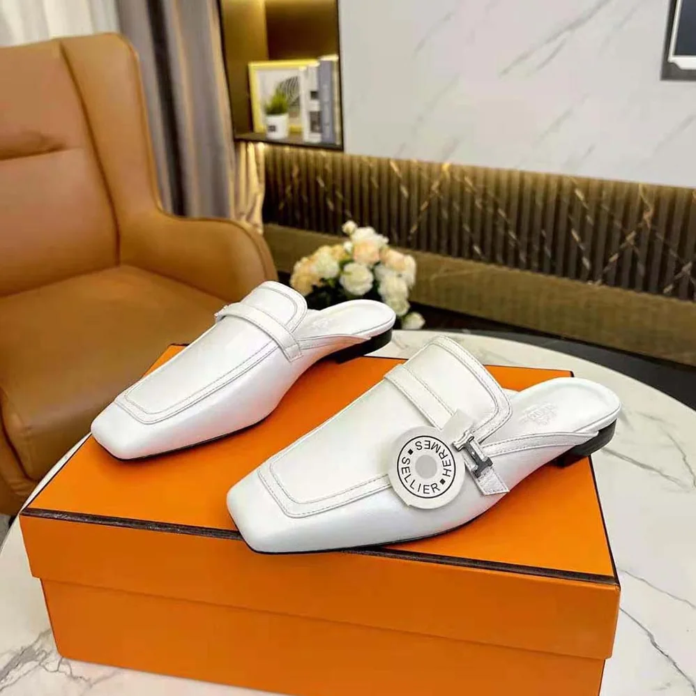 Hermes Groupie Mule in Goatskin with Miniature Palladium-Plated Paris Buckle for Women in White