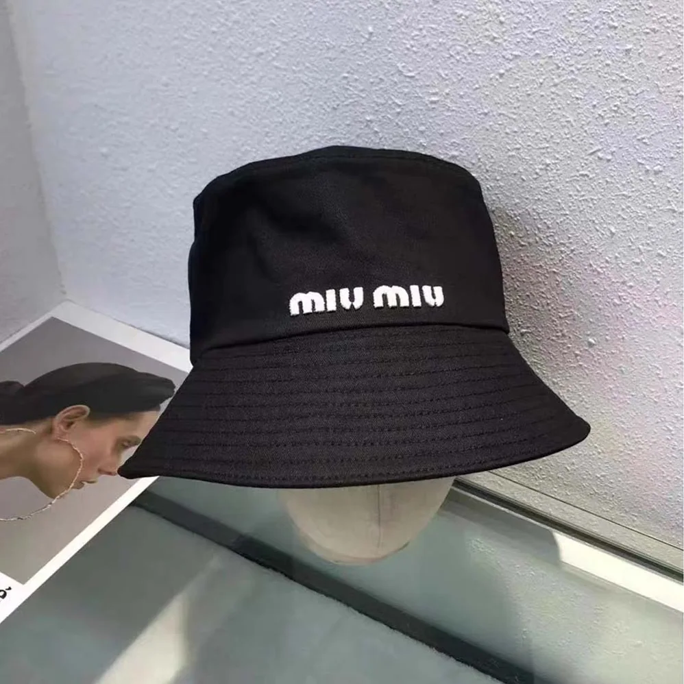 Miu Miu Drill Bucket Hat with Embroidered Logo for Women in Black