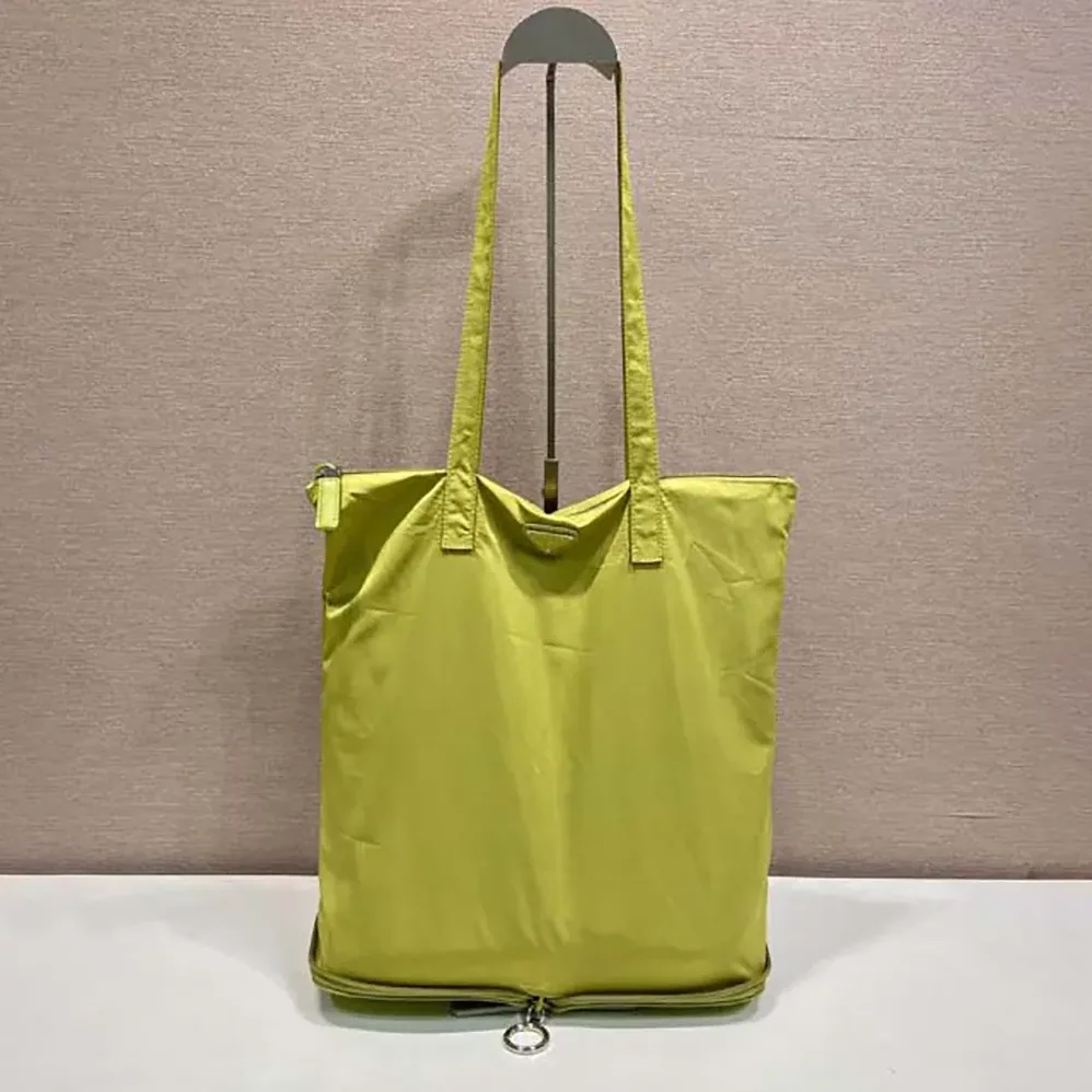 Prada Saffiano Leather Pendant With Re-Nylon Tote Bag for Women in Green Prada Saffiano Leather Pendant With Re-Nylon Tote Bag for Women in Green