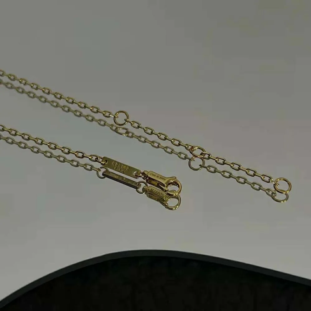 Celine Triomphe Folk Pompons Sautoir in Brass with Gold Finish for Women
