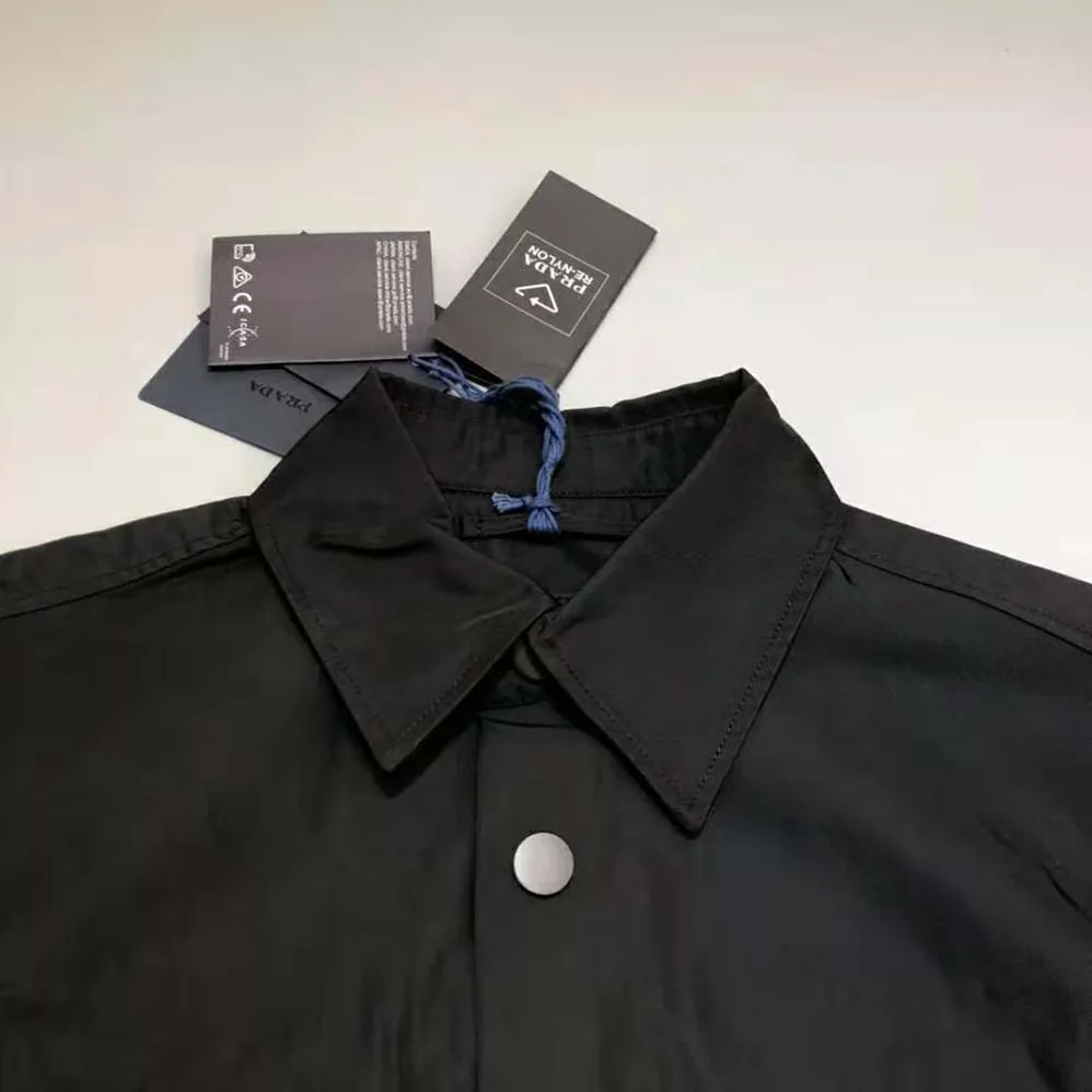Prada Defined by an Oversized Fit and Large Patch Pocket with Strap Re for Women in Nylon Shirt