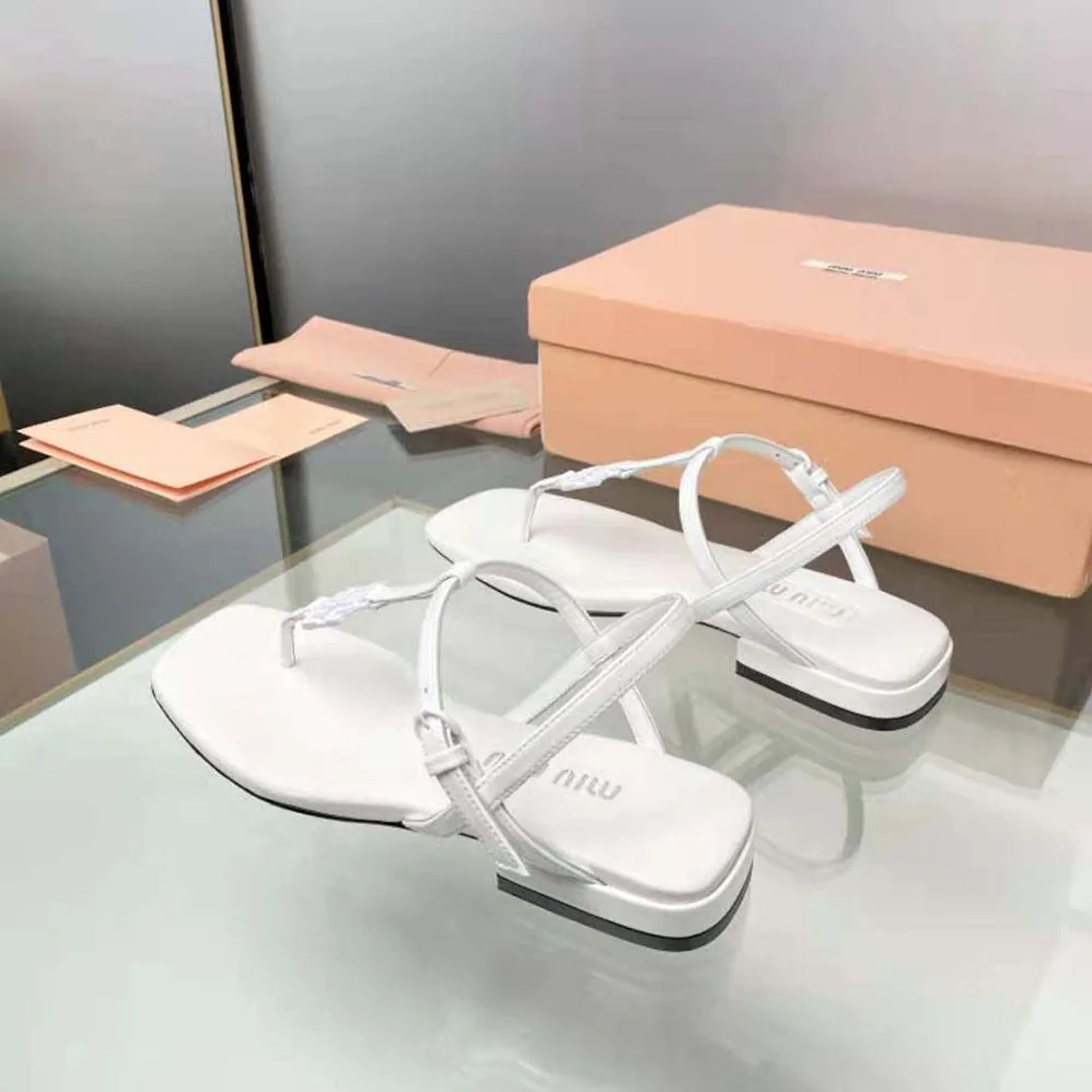 Miu Miu Patent Thong Sandals with Metal Lettering Logo for Women in White Miu Miu Patent Thong Sandals with Metal Lettering Logo for Women in White