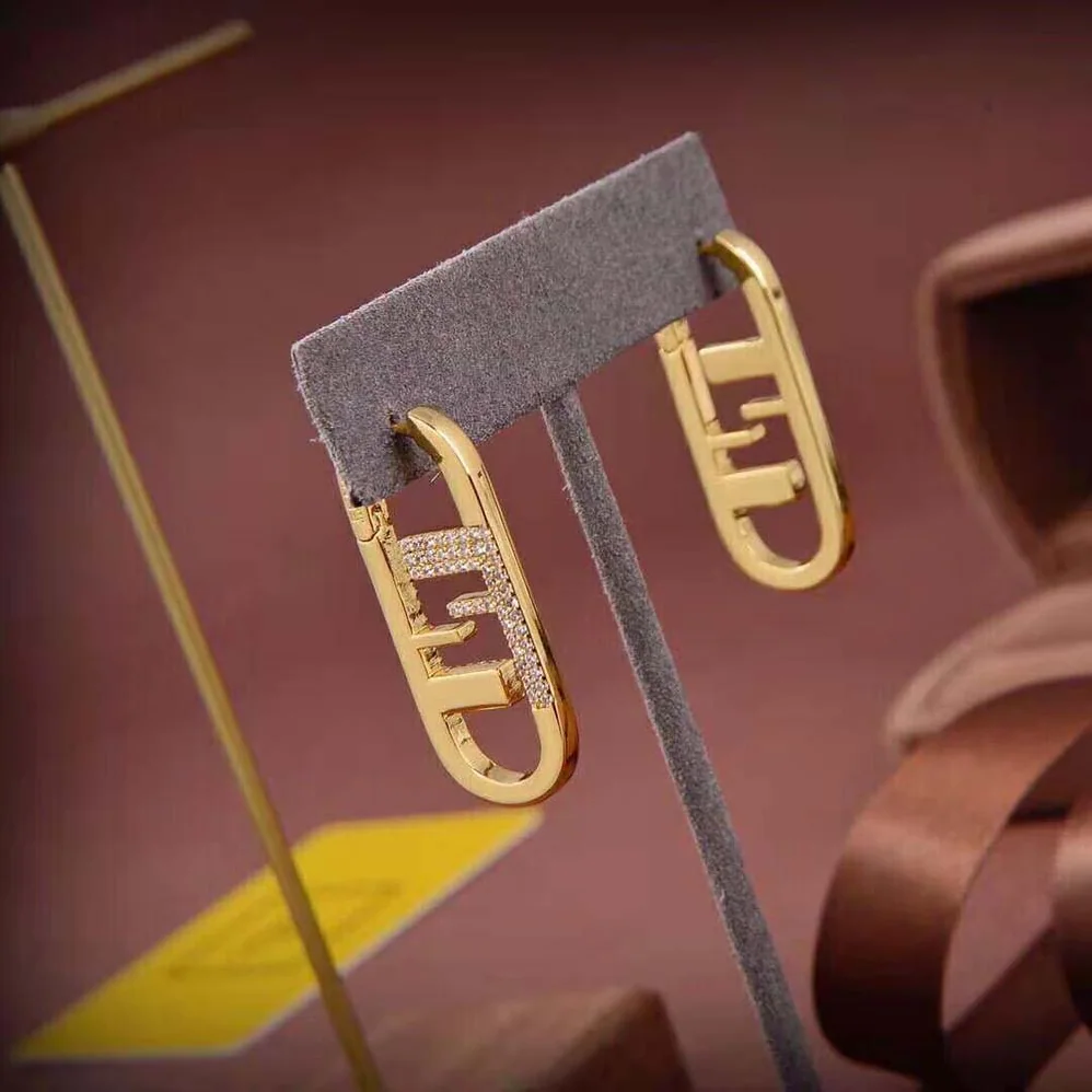 Fendi O'Lock Earrings Gold for Women in colored