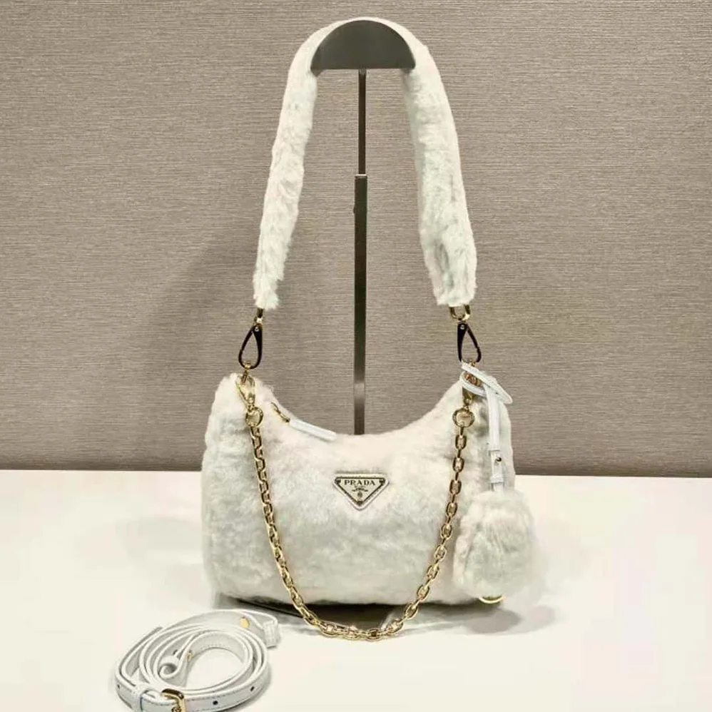 Prada Shearling Mini-Bag with the Enameled Metal Triangle Logo for Women in White Prada Shearling Mini-Bag with the Enameled Metal Triangle Logo for Women in White