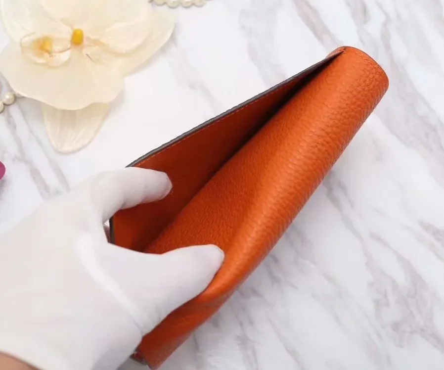 Hermes Constance Togo Long Wallet in Silver Toned Hardware Orange Hermes Constance Togo Long Wallet in Silver Toned Hardware Orange