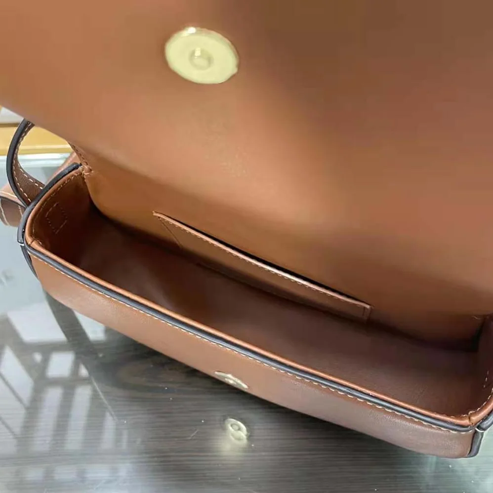 Celine Clutch on Strap in Smooth Calfskin for Women in Brown