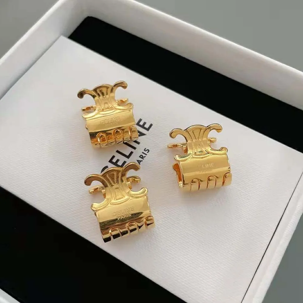 Celine Hair Accessories Set of 3 Mini Triomphe Claws in Brass with Gold Finish and Steel for Women Celine Hair Accessories Set of 3 Mini Triomphe Claws in Brass with Gold Finish and Steel for Women