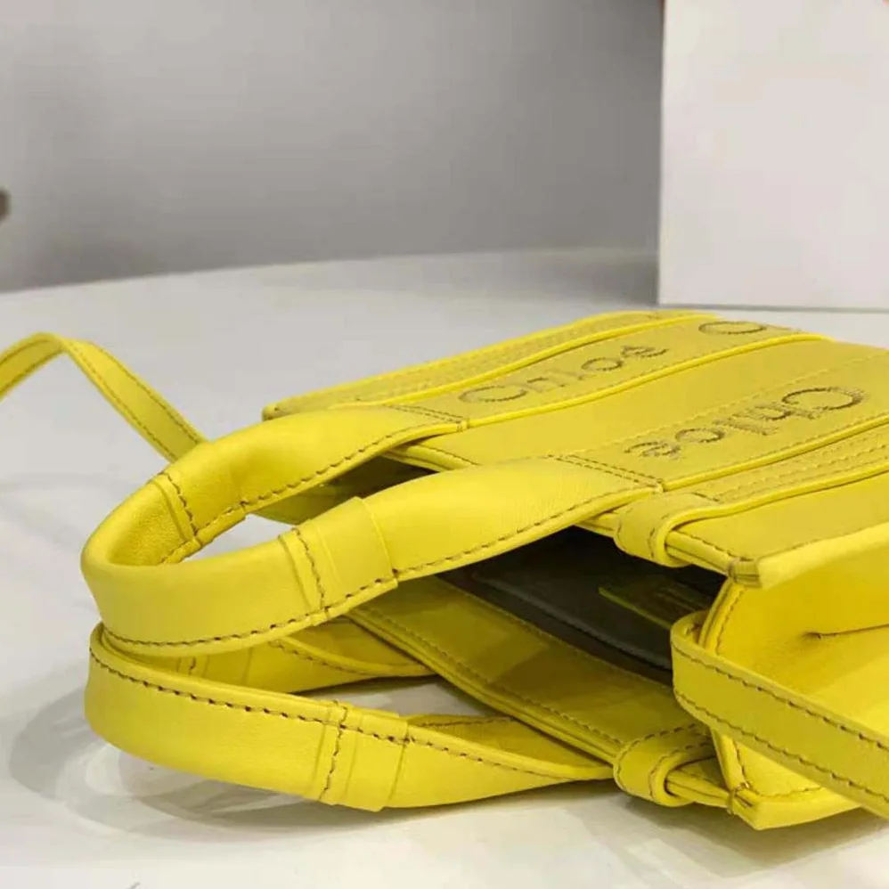 Chloe Mini Woody Tote Bag for Women in Yellow Chloe Mini Woody Tote Bag for Women in Yellow