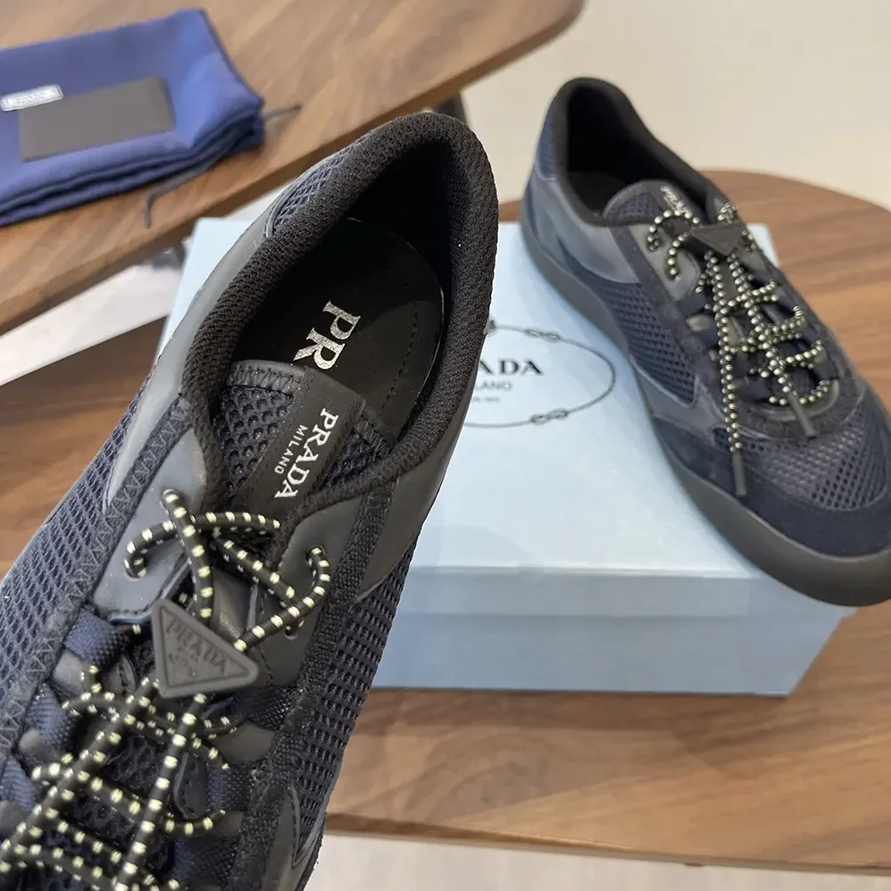 Prada Speedrock Leather And Mesh Fabric Sneakers for Unisex in Black