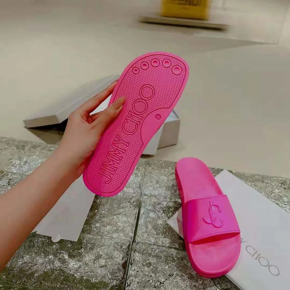 Jimmy Choo Port/F Neon Pink Rubber Slides with JC Monogram for Women Jimmy Choo Port/F Neon Pink Rubber Slides with JC Monogram for Women