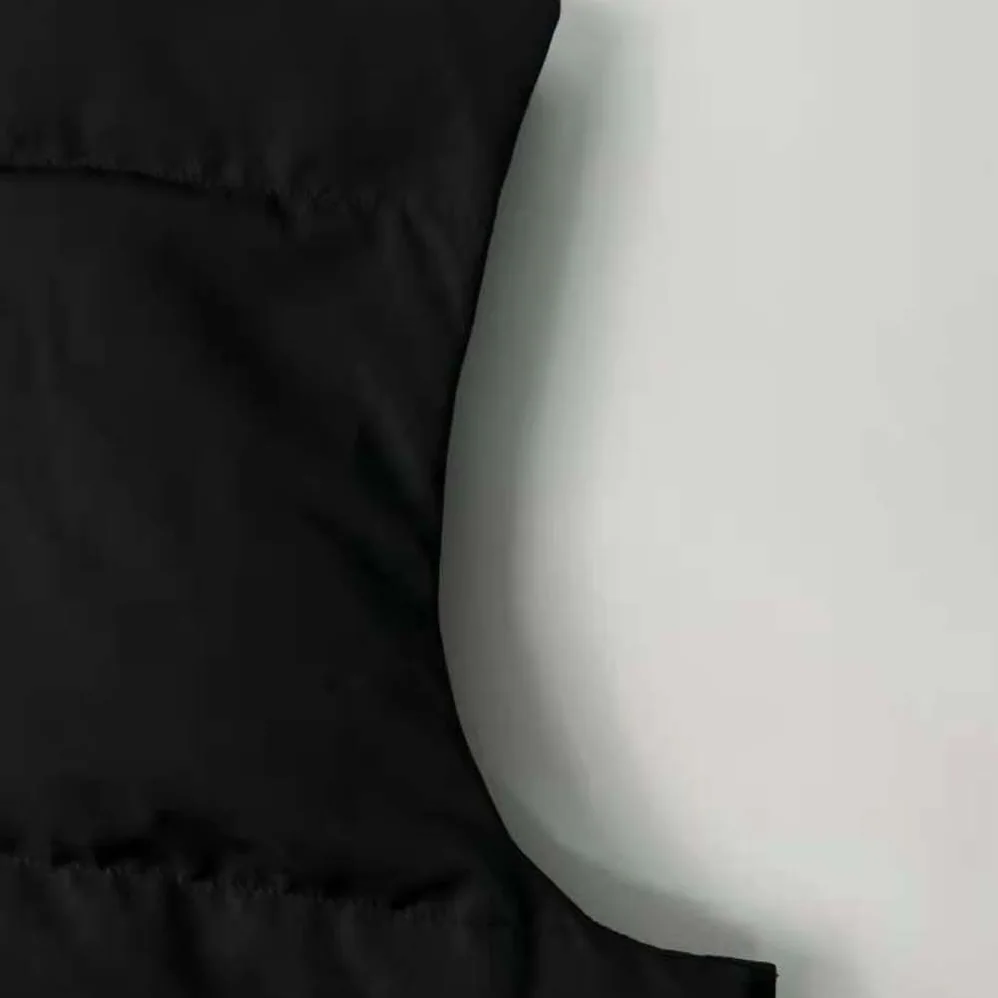 Givenchy Sleeveless Puffer Jacket with Metallic Details for Men Givenchy Sleeveless Puffer Jacket with Metallic Details for Men