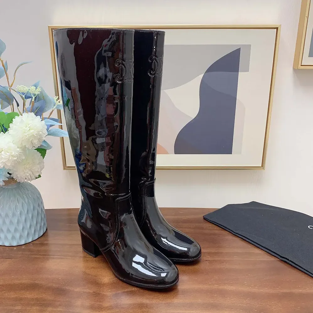 Celine Les Bottes Celine Triomphe High Boot in Patent Calfskin for Women in Black