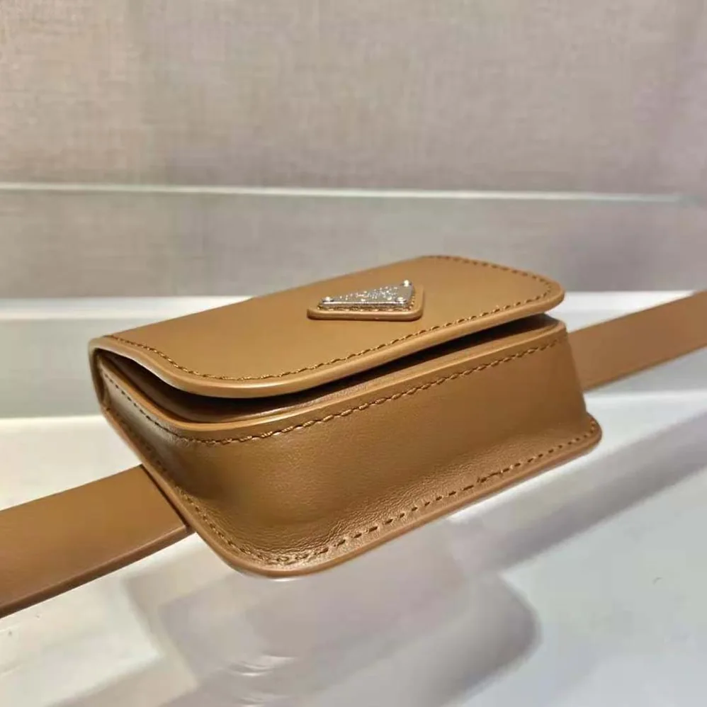Prada Leather Belt With a Hybrid Multifunctional Design for Women in Brown Prada Leather Belt With a Hybrid Multifunctional Design for Women in Brown