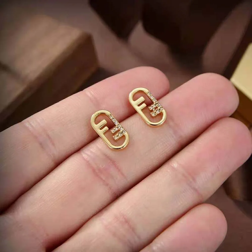 Fendi O'lock Earrings Gold for Women in Colored Earrings