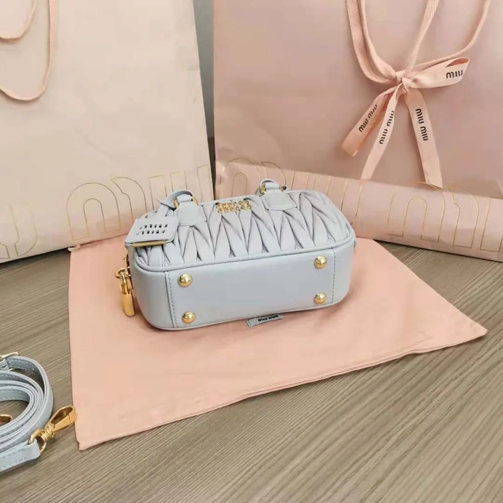 Miu Miu Matelassé Nappa Leather Top-Handle Bag for Women in Silver Miu Miu Matelassé Nappa Leather Top-Handle Bag for Women in Silver