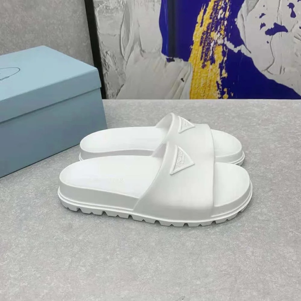 Prada Rubber Slides In 20 mm Heel Height for Women in White Prada Rubber Slides In 20 mm Heel Height for Women in White