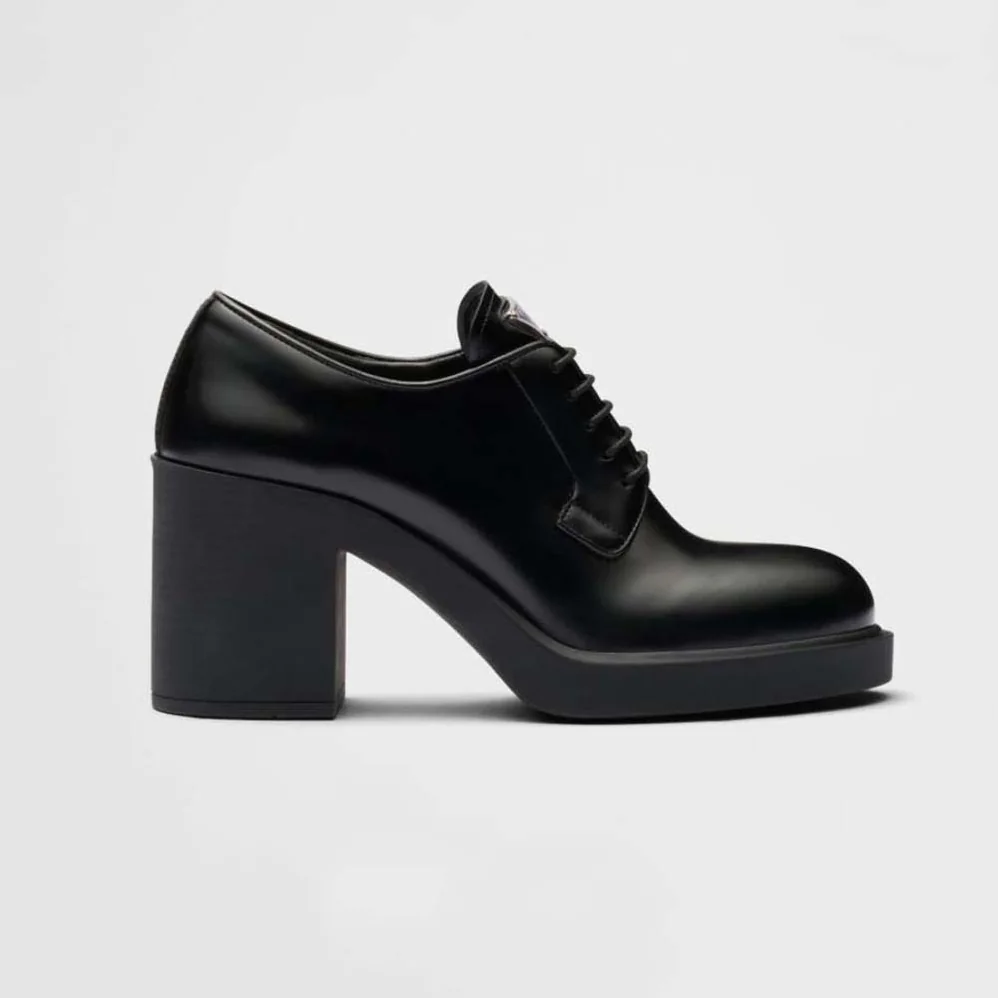 Prada Heeled Brushed Leather Lace-Ups for Women in Black Prada Heeled Brushed Leather Lace-Ups for Women in Black