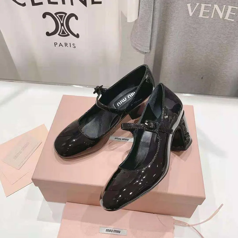 Miu Miu Patent Leather Pumps with Metal Lettering Logo for Women in Black Miu Miu Patent Leather Pumps with Metal Lettering Logo for Women in Black