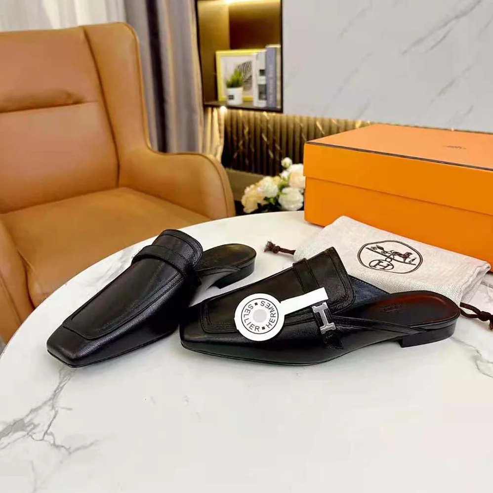 Hermes Groupie Mule in Goatskin with Miniature Palladium-Plated Paris Buckle for Women in Black