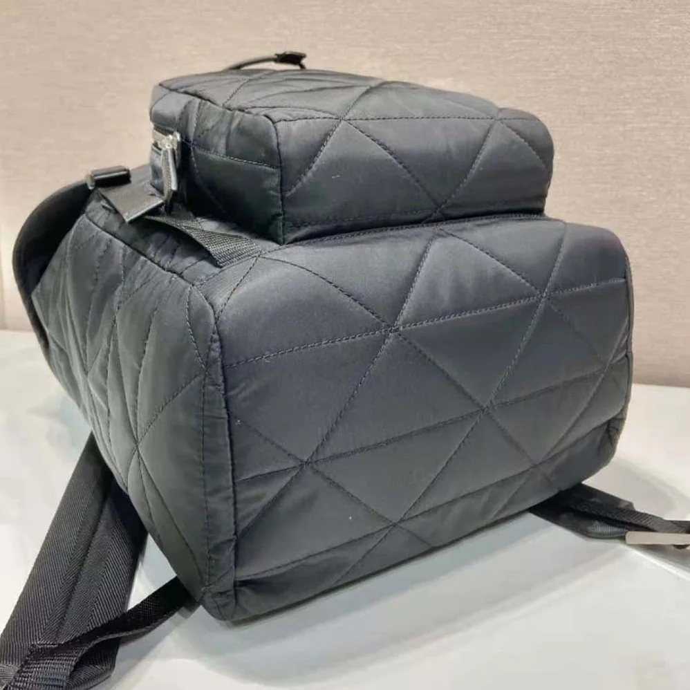 Prada Re-Nylon Backpack with Topstitching for Men in Black Prada Re-Nylon Backpack with Topstitching for Men in Black