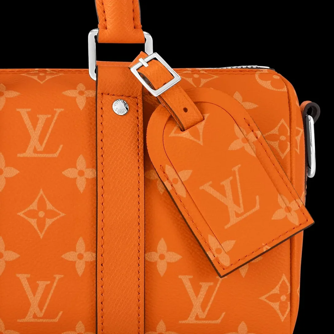 Louis Vuitton Keepall Bandouliere 25 Travel Bag in Orange Silver Hardware Louis Vuitton Keepall Bandouliere 25 Travel Bag in Orange Silver Hardware
