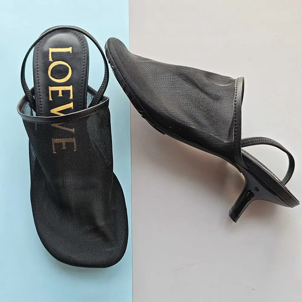 Loewe Petal Slingback Heel Sandal in Mesh for Women in Black Loewe Petal Slingback Heel Sandal in Mesh for Women in Black