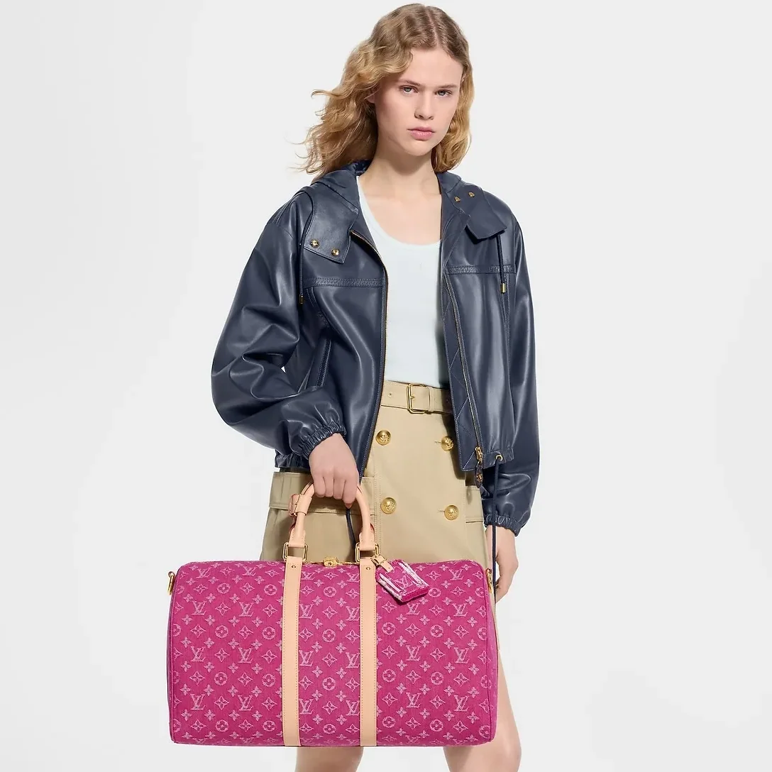 Louis Vuitton Keepall Bandouliere 45 Travel Bag in Fuchsia Denim Gold Hardware