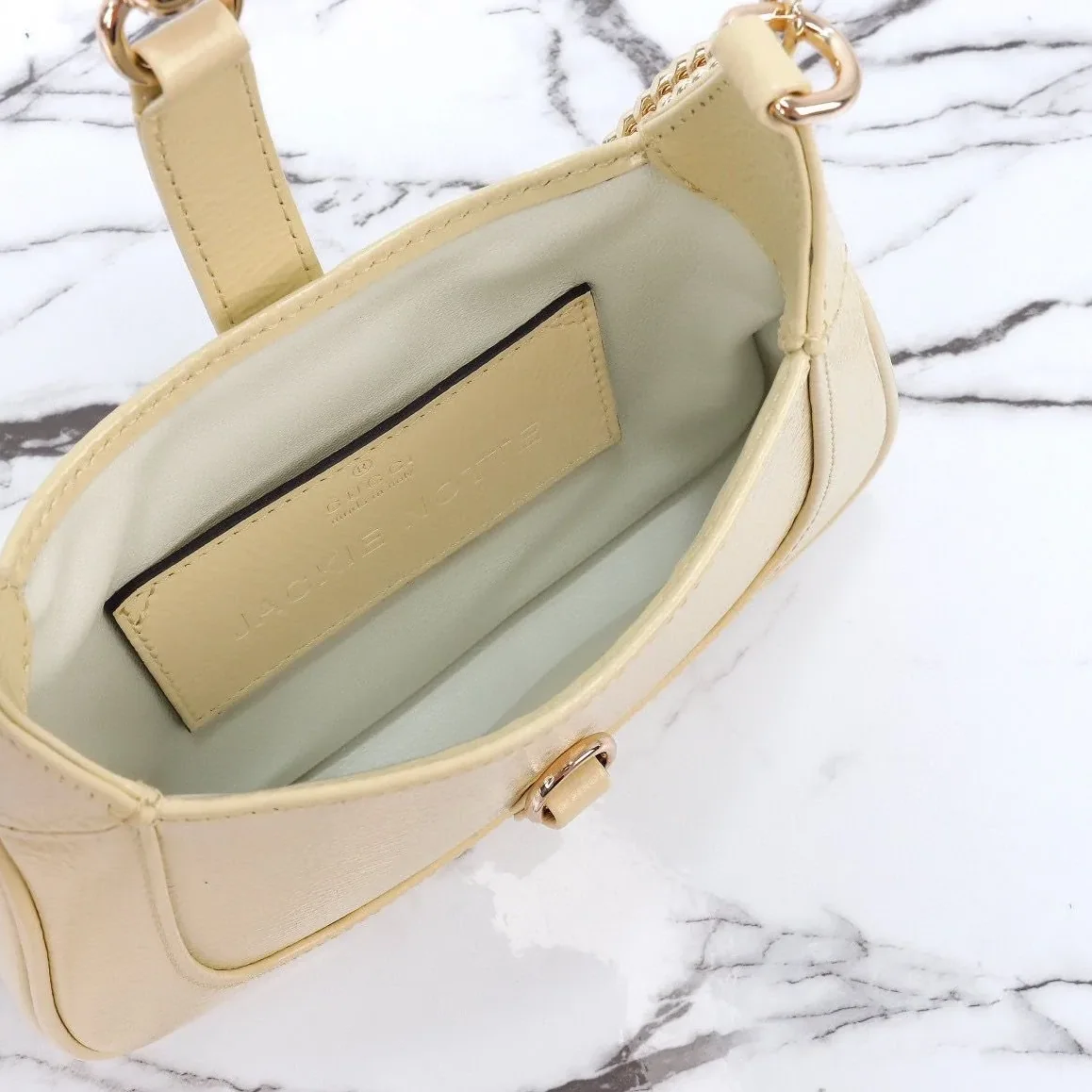 Gucci Jackie Notte Mini Crossbody Bag in Light Yellow Gold Hardware