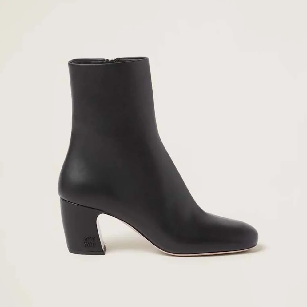 Miu Miu Leather Booties with Metal Lettering Logo for Women in Black