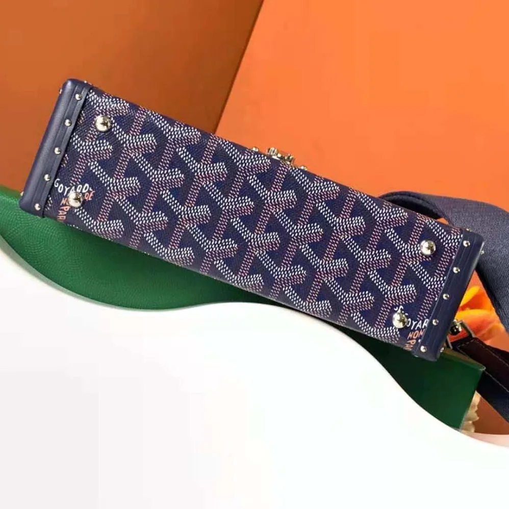 Goyard Cassette Trunk Bag in Goyardine Canvas & Clamecy Cowhide for Women in Navy Goyard Cassette Trunk Bag in Goyardine Canvas & Clamecy Cowhide for Women in Navy