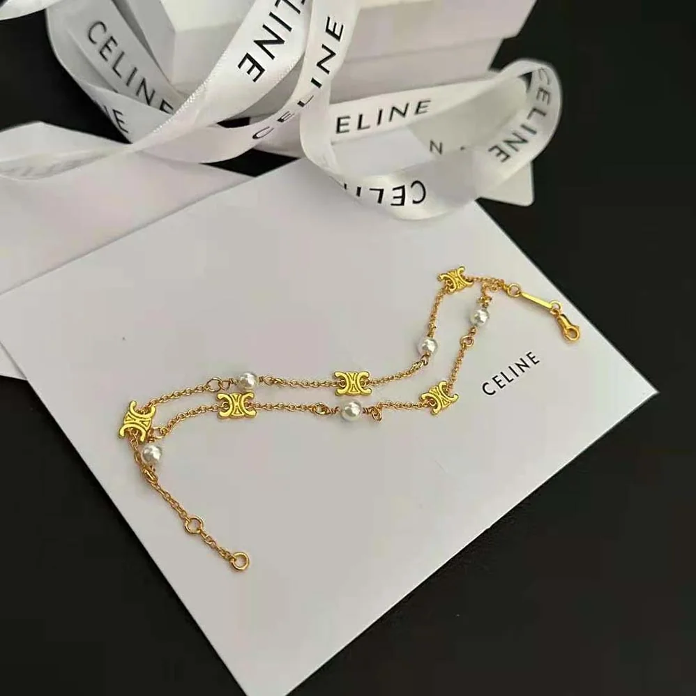 Celine Triomphe Pearl Double Bracelet in Brass with Gold Finish and Resin Pearls for Women