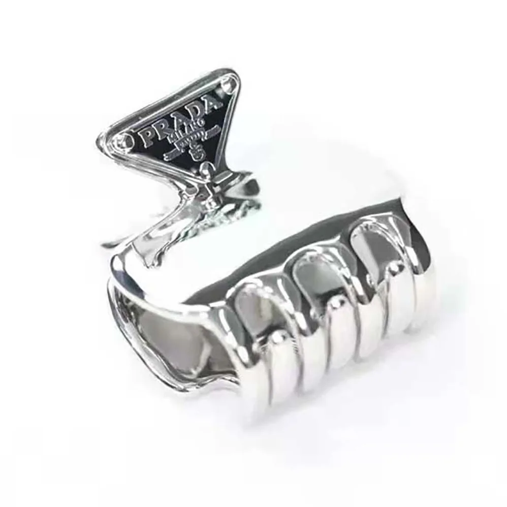Prada Metal Hair Clip with Enameled for Women in Metal Triangle Logo Prada Metal Hair Clip with Enameled for Women in Metal Triangle Logo