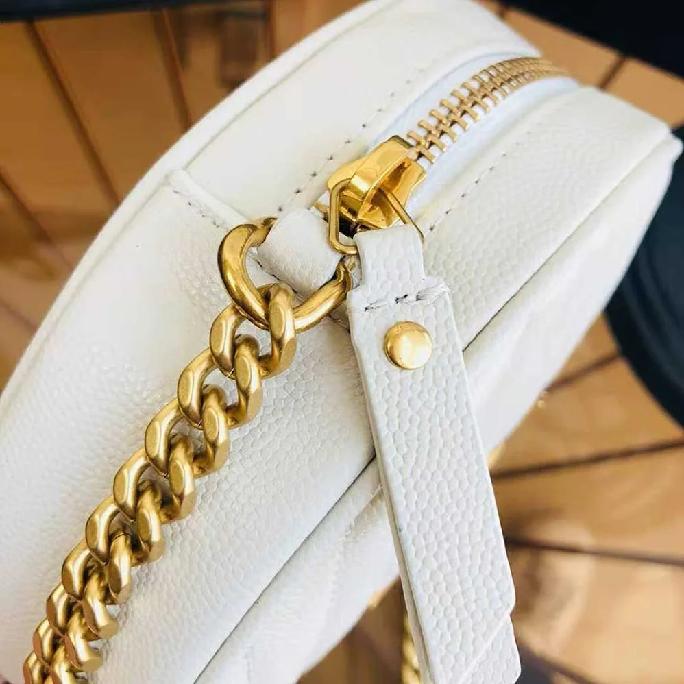 Saint Laurent YSL Vinyle Round Camera Bag in Chevron-Quilted Grain de Poudre Embossed Leather for Women in White
