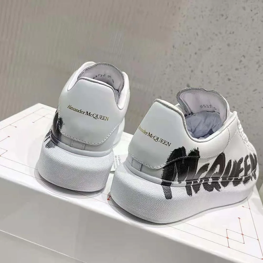 Alexander Mcqueen Online Exclusive Mcqueen Graffiti Oversized Sneaker in White for Unisex in black Alexander Mcqueen Online Exclusive Mcqueen Graffiti Oversized Sneaker in White for Unisex in black