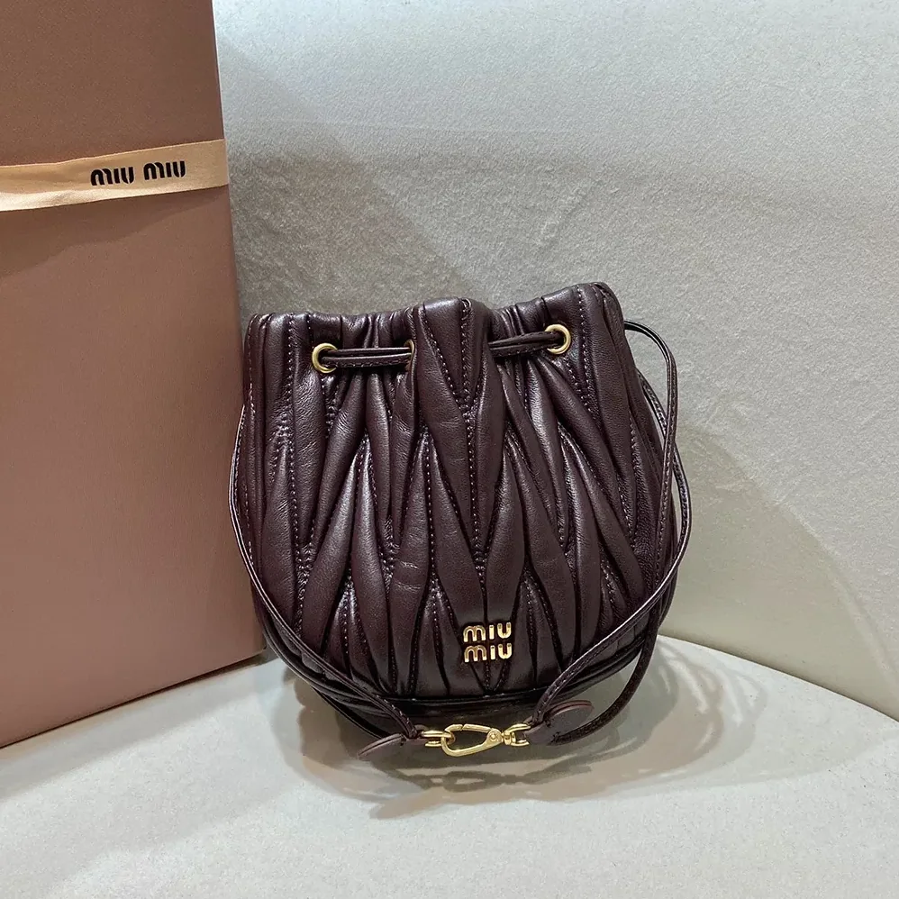Miu Miu Matelassé Nappa Leather Pouch for Women in Burgundy Miu Miu Matelassé Nappa Leather Pouch for Women in Burgundy