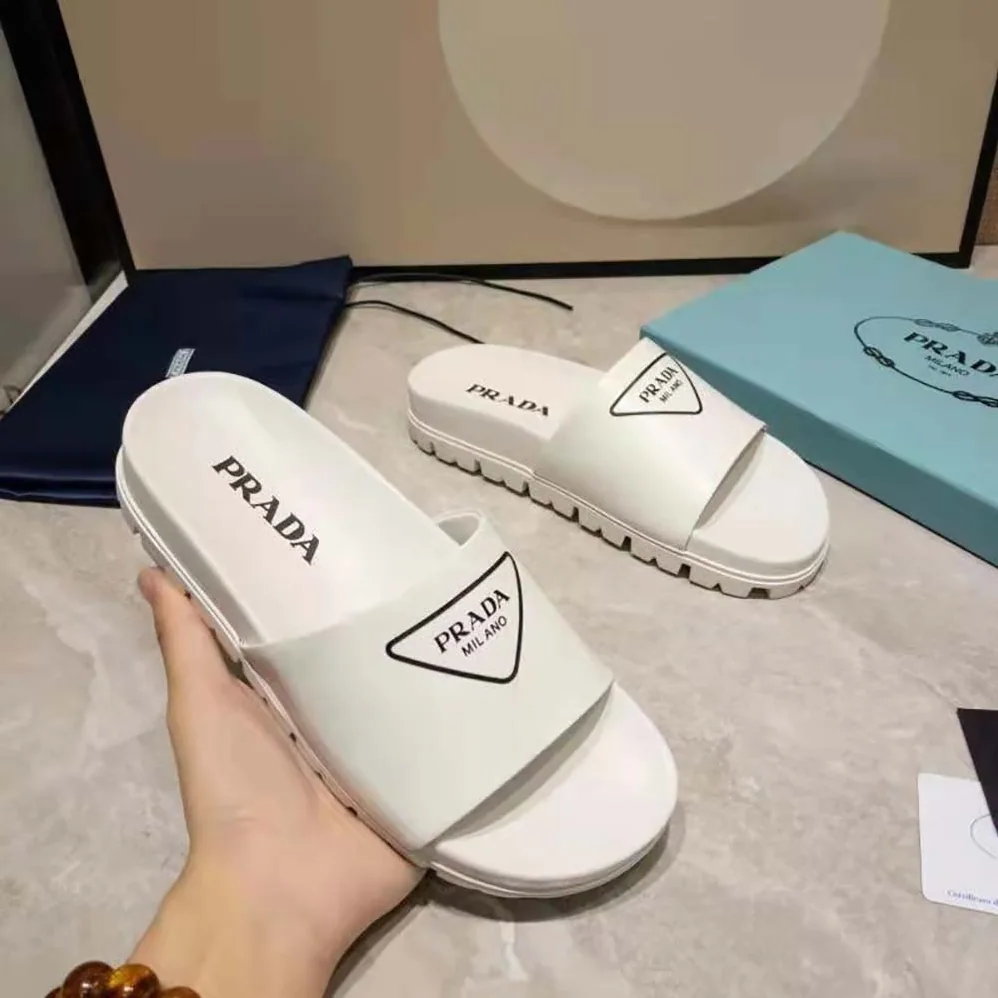 Prada Leather Slides in 20mm Heel for Women in White Prada Leather Slides in 20mm Heel for Women in White