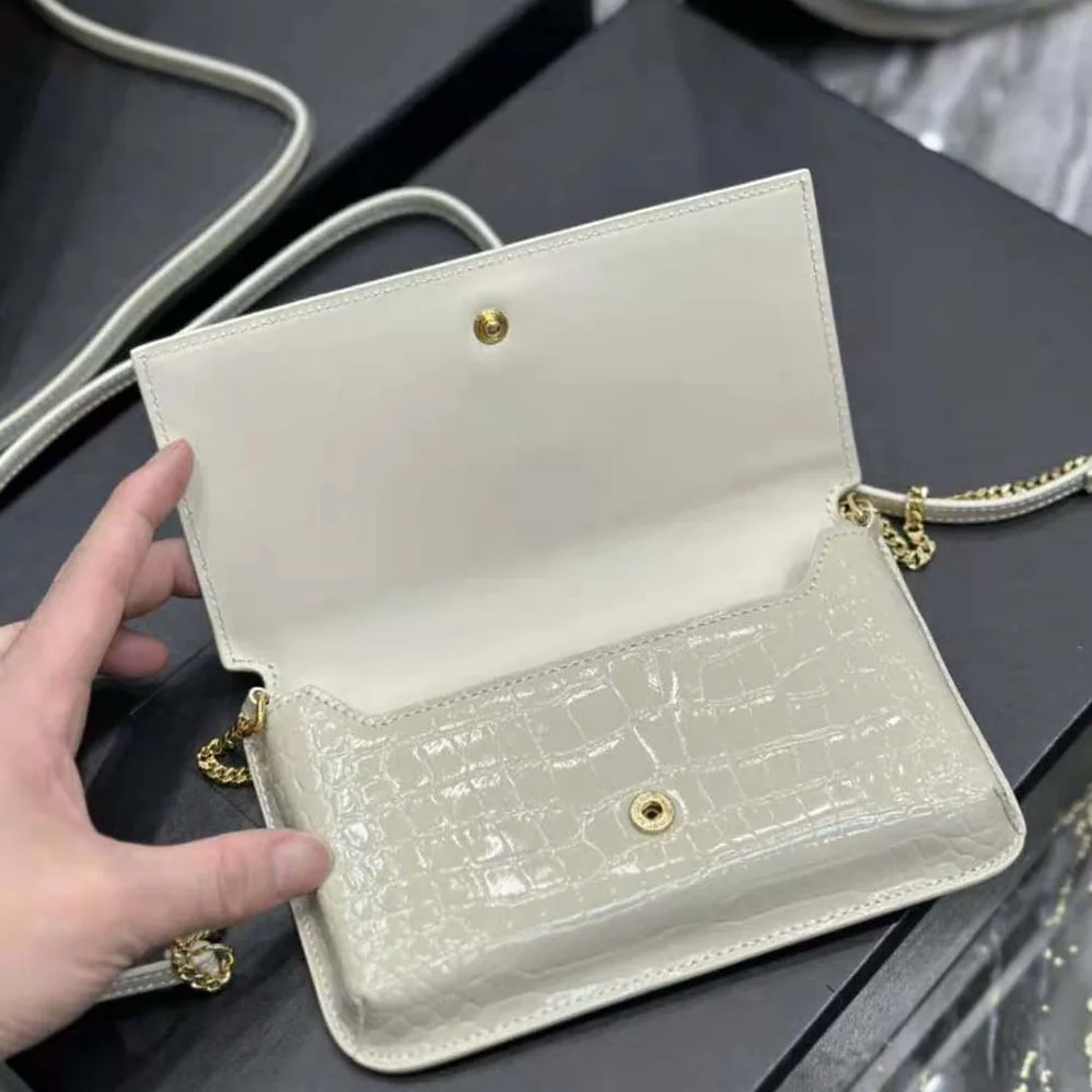 Saint Laurent YSL Cassandre Phone Holder with Strap in Shiny Crocodile-Embossed Leather for Women in White Saint Laurent YSL Cassandre Phone Holder with Strap in Shiny Crocodile-Embossed Leather for Women in White