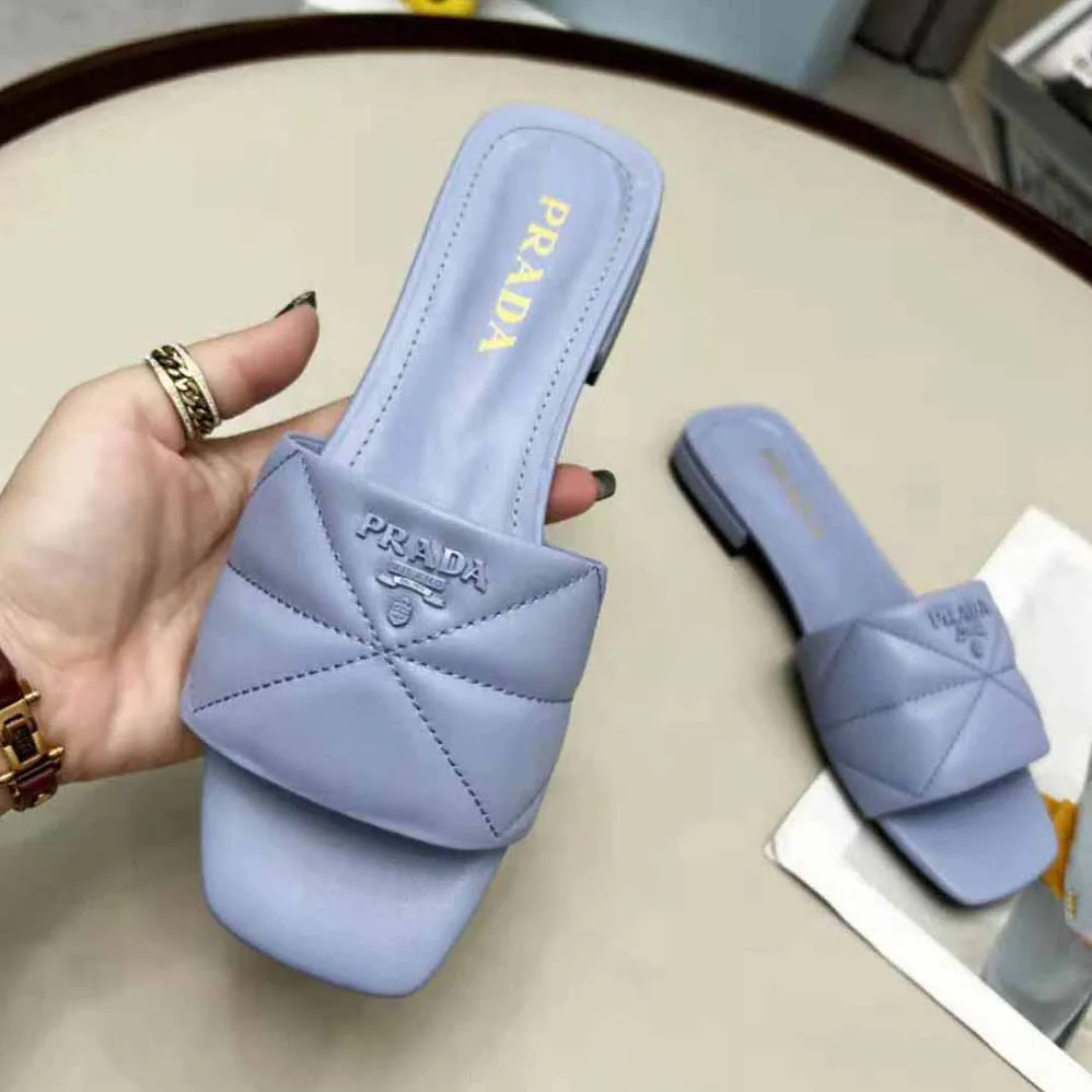 Prada Quilted Nappa Leather Sabots for Women in Blue