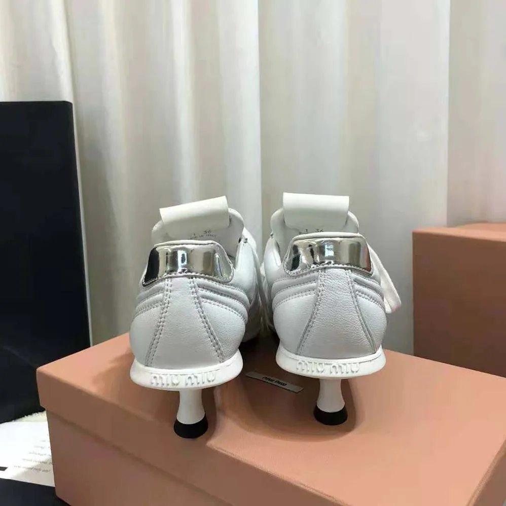 Miu Miu Nappa Leather Mid-heel Sneakers for Women in White