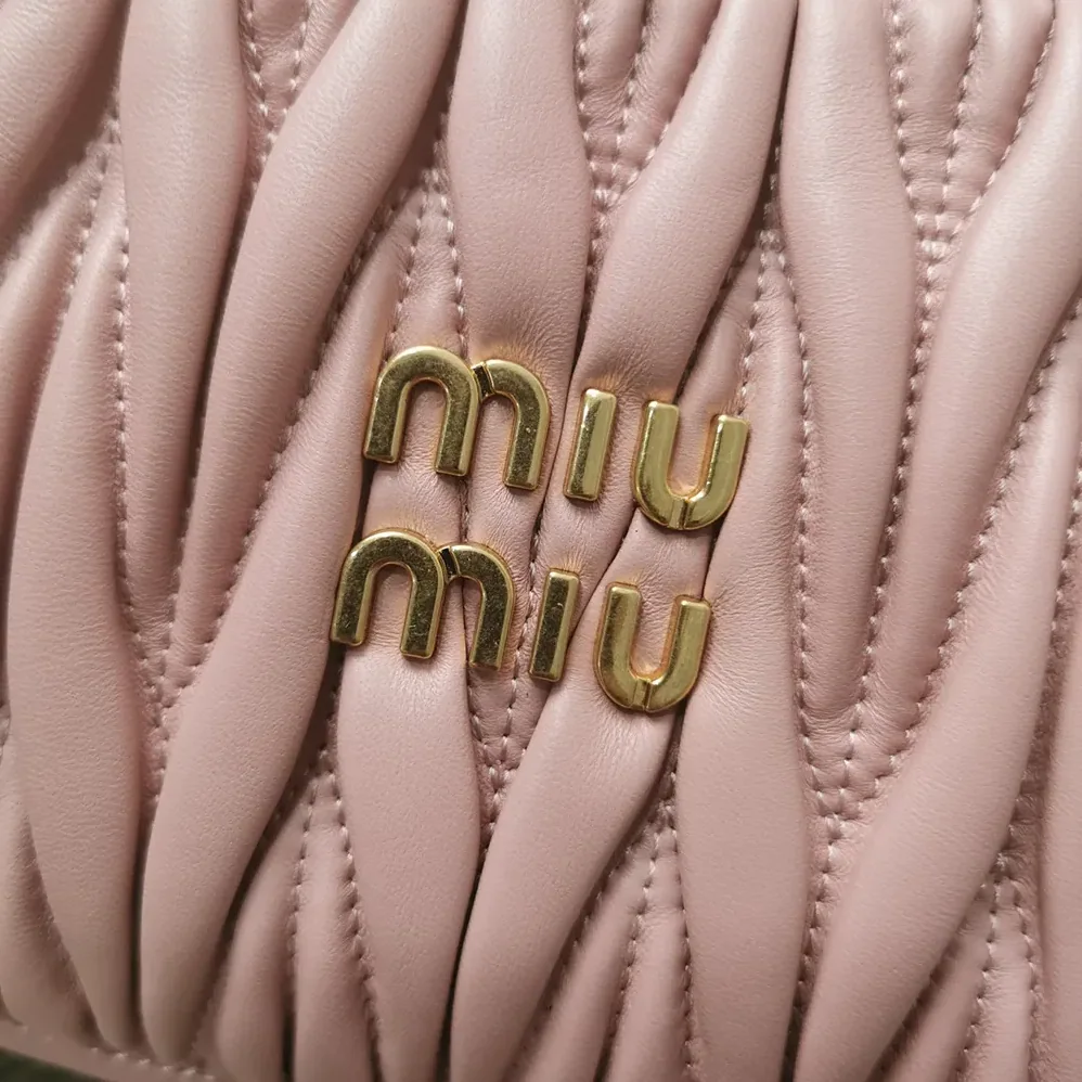 Miu Miu Wander Matelassé Nappa Leather Hobo Bag for Women in Alabaster Pink Miu Miu Wander Matelassé Nappa Leather Hobo Bag for Women in Alabaster Pink