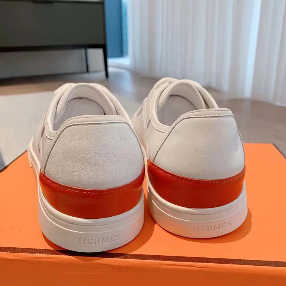 Hermes Get Sneaker in Calfskin with Signature “Hermès Paris” Stencil for Unisex in White Hermes Get Sneaker in Calfskin with Signature “Hermès Paris” Stencil for Unisex in White