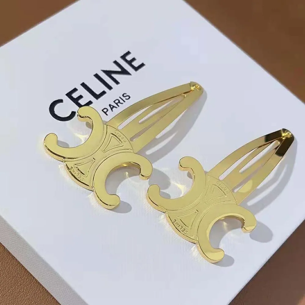 Celine Hair Accessories Set of 2 Triomphe Snap Hair Clips in Brass with Gold Finish and Steel for Women Celine Hair Accessories Set of 2 Triomphe Snap Hair Clips in Brass with Gold Finish and Steel for Women