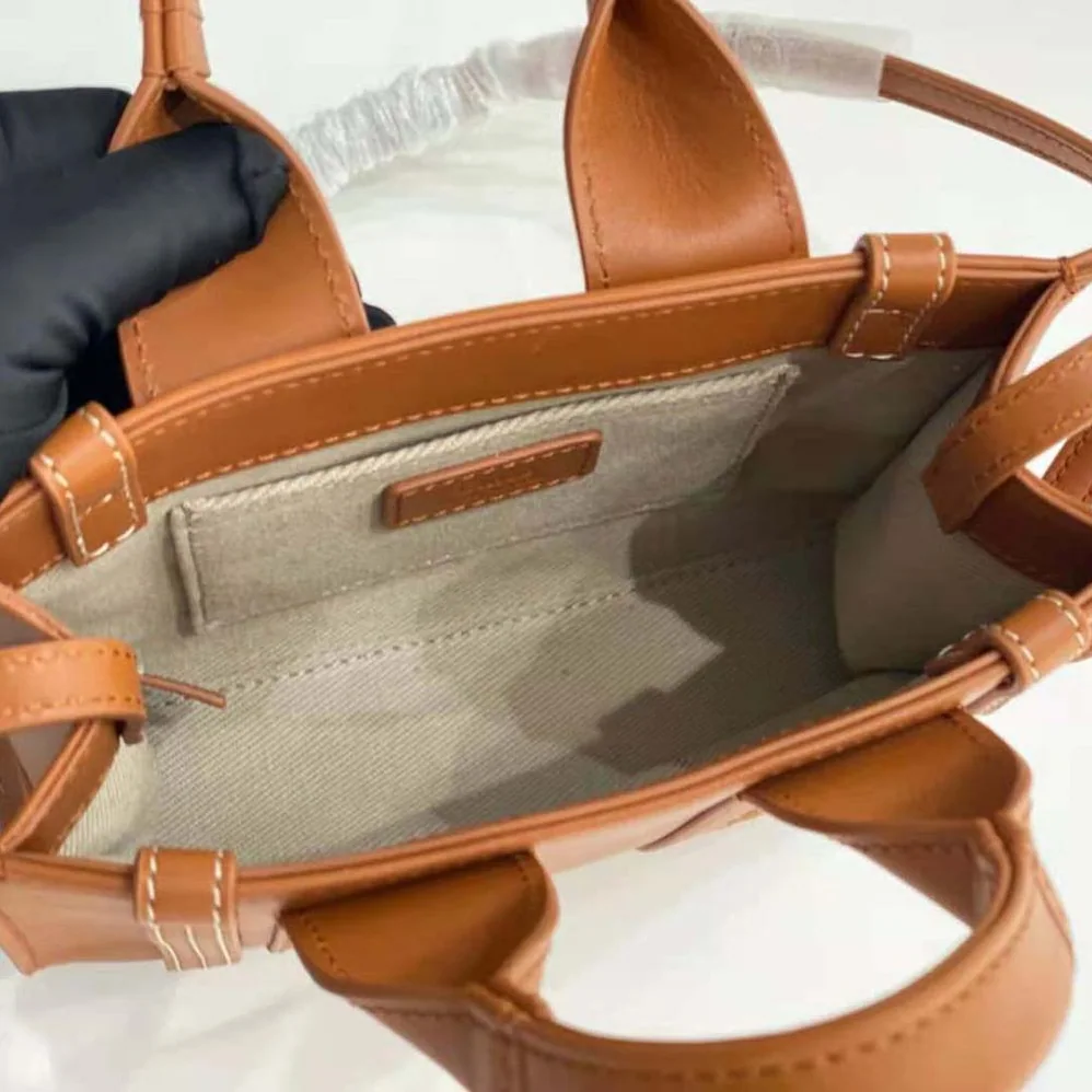 Chloe Mini Woody Tote Bag with Embroidered Chloé Logo for Women in Brown Chloe Mini Woody Tote Bag with Embroidered Chloé Logo for Women in Brown