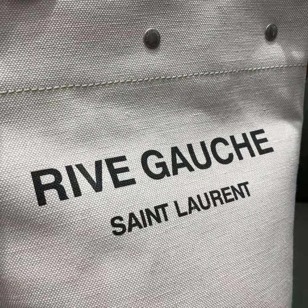 Saint Laurent YSL Rive Gauche Bucket Bag in Linen for Women in Brown