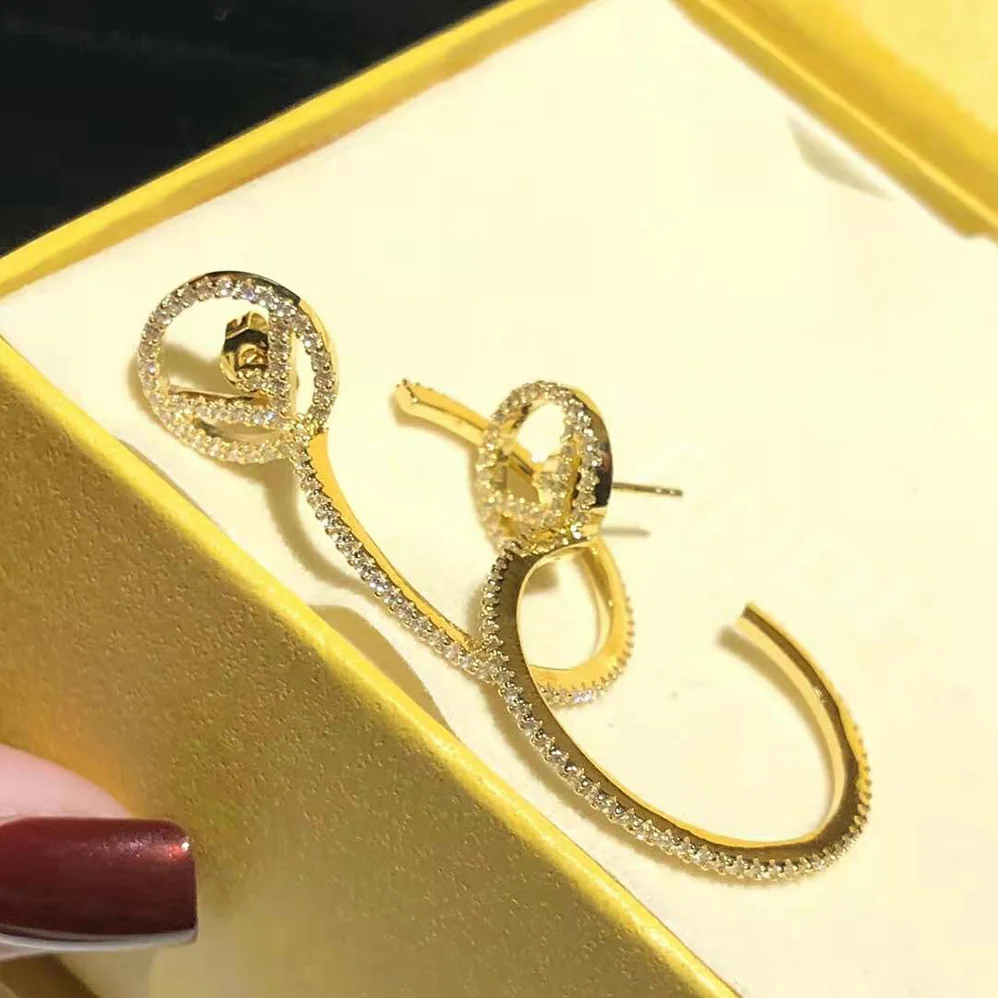 Fendi F is Fendi Earring Gold for Women in color Fendi F is Fendi Earring Gold for Women in color